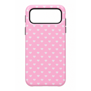 Pink Phone Case with White Heart Pattern and Black Camera Cutout.