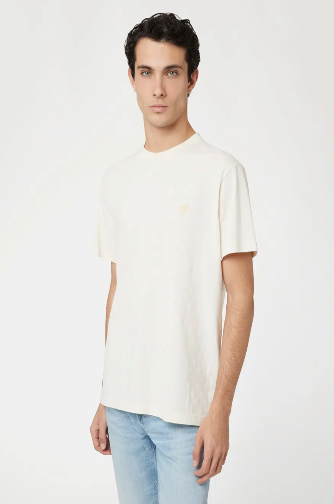 Men's short-sleeved T-shirt with a regular fit and hip length. Solid-tone design with a checkered texture and a Guess triangular appliqué on the upper left corner. With a round neckline.S
