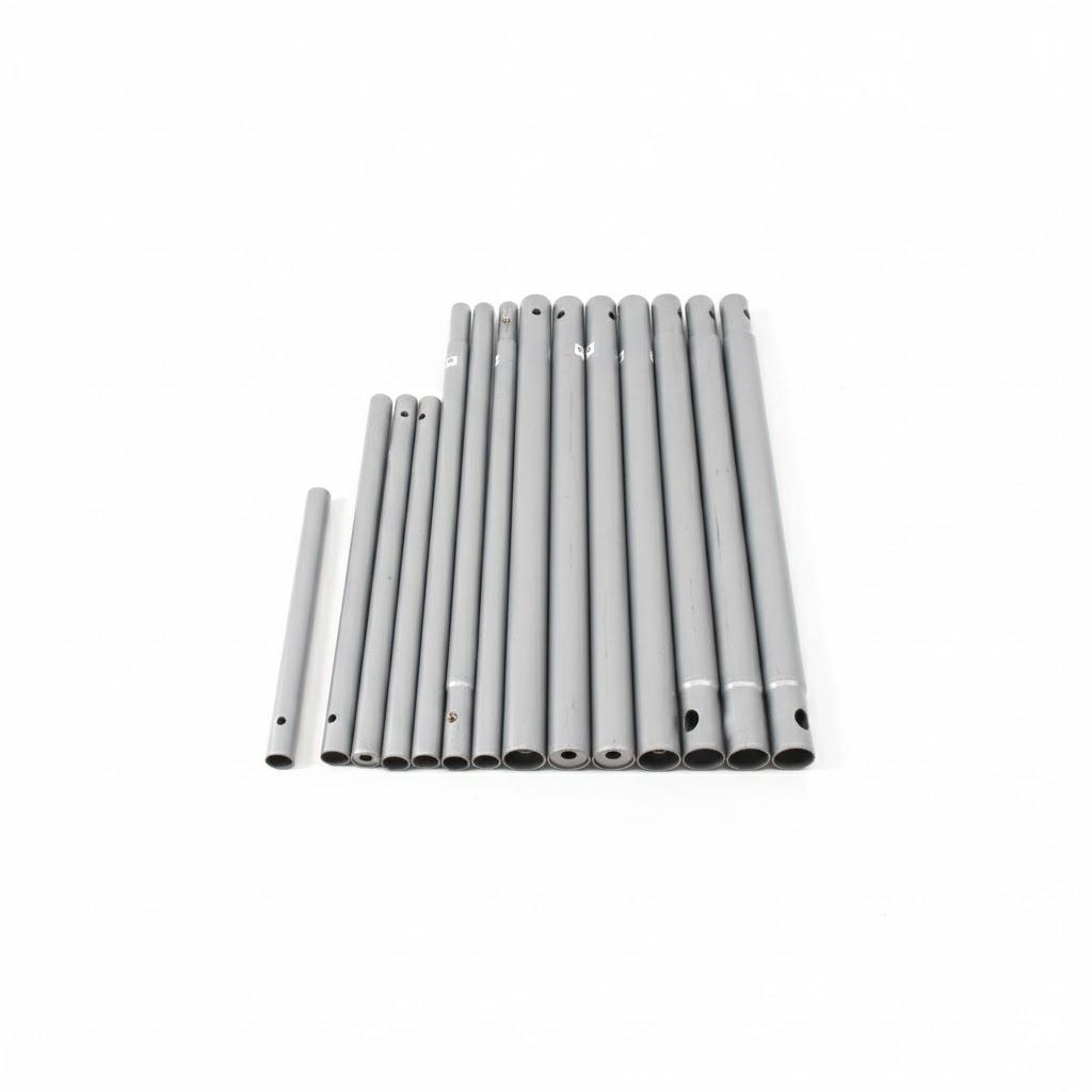 Several Aluminum Tubes Or Poles That Are Components Of a Larger Structural Assembly