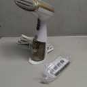 Conair Handheld Garment Steamer for Clothes, Turbo ExtremeSteam 1875W Fabric Steamer, Portable Handheld Design, Strong Penetrating Steam, White/Champagne