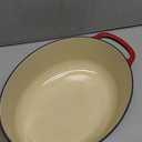 Lodge 7 Quart Enameled Cast Iron Oval Dutch Oven with Lid  Dual Handles  Oven Safe up to 500 F or on Stovetop - Use to Marinate, Cook, Bake, Refrigerate and Serve  Red