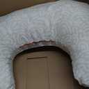 Boppy Nursing Pillow - Firm, Ergonomic U-Shaped Bottle and Breastfeeding Pillow with High Lift for Comfort and Support, Spacious Surface - Cream Retro Squiggles