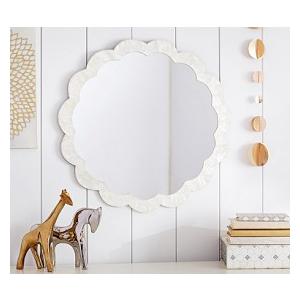 White sun-shaped mirror