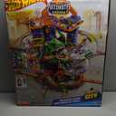 Hot Wheels City Robo T-Rex Ultimate Garage Multi-Level Multi-Play Mode Stores 100 Plus 1:64 Scale Cars Gift idea for Kids 3 and Older