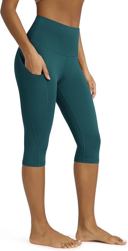 ODODOS Women's High Waisted Yoga Capris with Pockets, Tummy Control Non See Through Workout Athletic Running Capri Leggings, Large