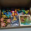 128PCS Dinosaur Party Favors for Kids, Dino Birthday Goodie Bags Set with Puzzles, 50 Stickers, Keychains, Fridge Magnets, Acrylic Crystal Dinosaurs, Dino Pull-Back Cars, Bookmarks & Burlap Gift Bags