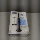 Oral-B iO Deep Clean + Protect Rechargeable Electric Toothbrush, Black with a iO Series 7 Toothbrush, 2 Replacement Brush Heads, and a Charging Travel Case