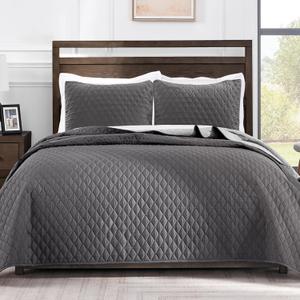 Dark gray quilted bedding or comforter set