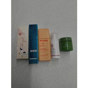 Hair-like Strokes Eyebrow Pen; EltaMD UV Clear Face Sunscreen SPF 46;  JUICE Play Up Lip Crayon-Play; BYOMA SPF 50 Face Fluid; Aveda Be Curly Advanced Intensive Curl Perfecting Masque