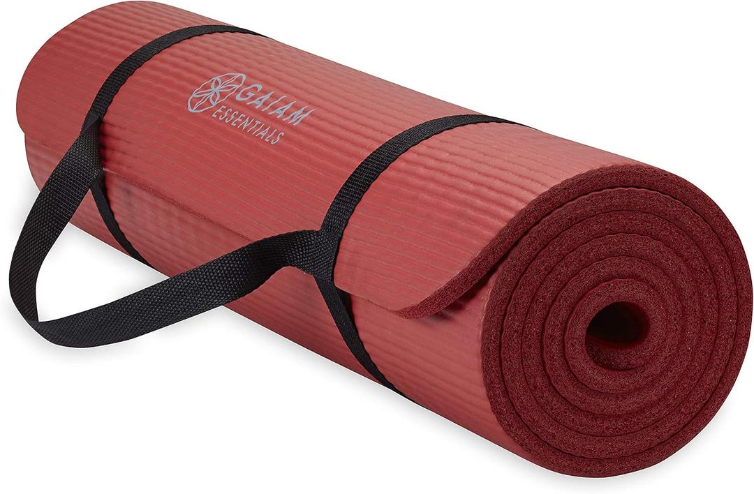 Gaiam Essentials Thick Yoga Mat with Easy-Cinch Strap (Red, 10mm) | Extra-Thick 10mm Cushioning | Textured Non-Slip Surface | Carrying Strap Included | Yoga, Pilates & Floor Workouts | 68"x24"
