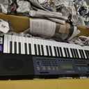 RockJam 61 Key Keyboard Piano with Pitch Bend, Power Supply, Sheet Music Stand, Piano Note Stickers & Simply Piano Lessons