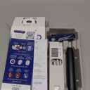 Oral-B Rechargeable Electric Toothbrush, iO2 Starter Kit, 3 Cleaning Modes, Automatic Pressure Sensor to Protect Gums, 2 Brush Heads, Night Black