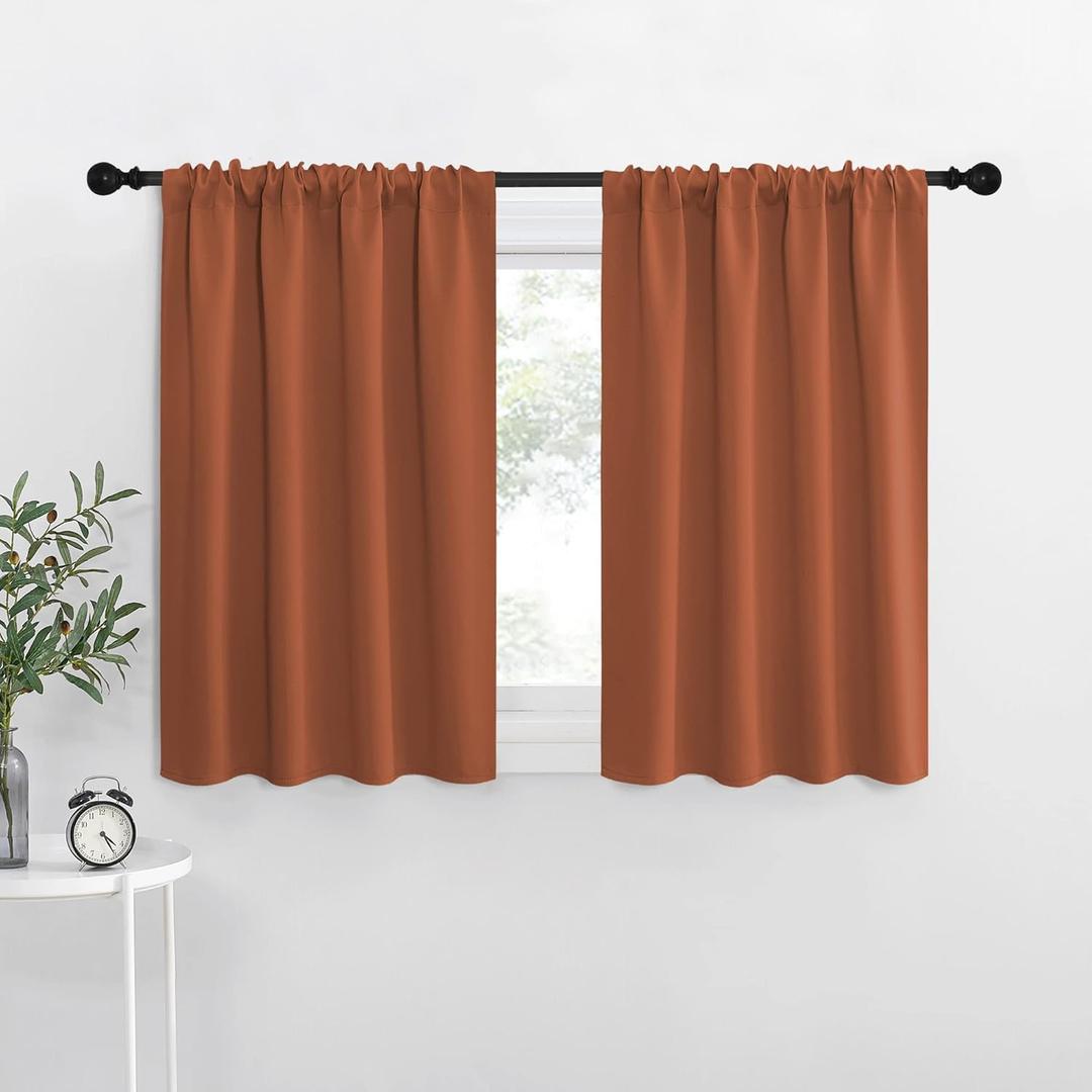 NICETOWN Blackout Curtains and Drapes - Thermal Insulated Solid Rod Pocket Blackout Draperies/ Panels (Burnt Orange, 1 Pair, 34 by 84 inches)