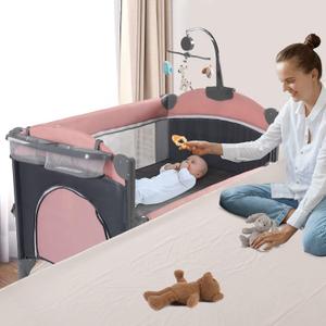 5 in 1 Baby Crib,Baby Bassinet, Bedside Cribs, Pack and Play with Changing Table, Portable Travel bedToys & Music Box,Mattress for Girl Boy Infant Newborn (Pink)