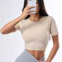 SweatyRocks Women's Twist Open Back Athletic Shirt Short Sleeve Crew Neck Workout Crop Tops (Beige, L)