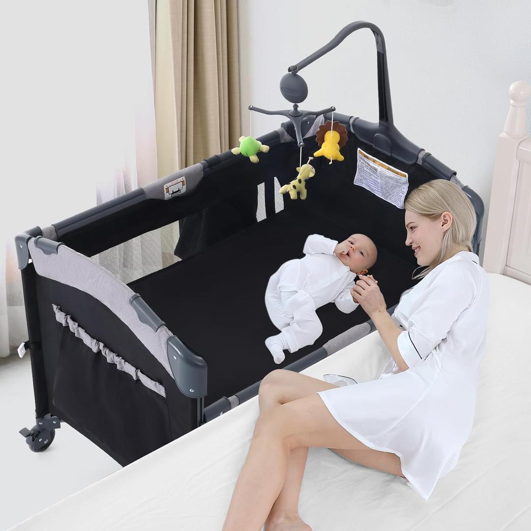 Jaoul 5 in 1 Baby Crib, Bassinet Beside Sleeper, Pack and Play with Bassinet and Changing Table Portable Travel Baby Playpen with Toys & Music Box, Mattress for Girl Boy Infant Newborn Black
