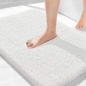 Yimobra Bath Rugs for Bathroom 32X20, Plush Non Slip Bath Mat,Off White
Ultra Soft,Quick Dry&Absorbent, Machine Washable, Plush Tub and Shower Floor Rug, Single Sink, Home Decor Essentials