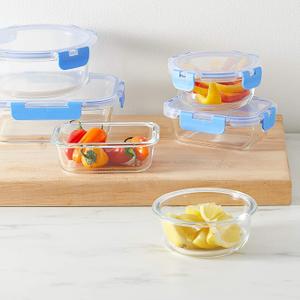 Amazon Basics Glass Food Storage Containers with Locking Lids, Set of 4, 8 pieces including lids, BPA-Free, clear with blue silicone ring