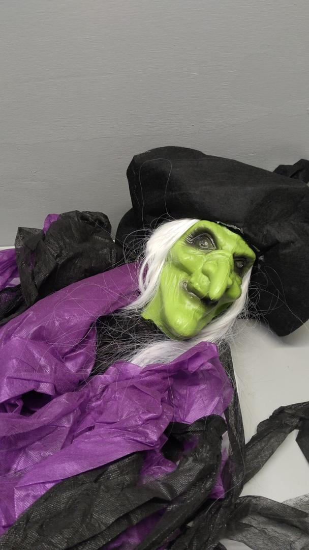Halloween Standing Witch with Lighted Eyes and Automatic Wing Movement