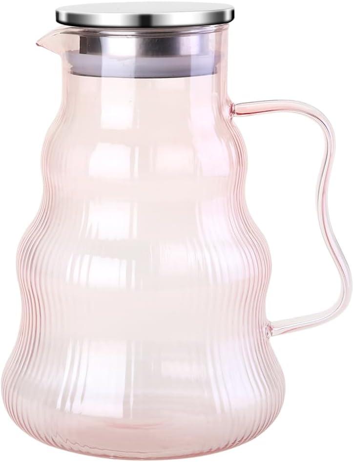 High Borosilicate Glass pitcherChristmas tree design, dopamine-hued color scheme. Beyond serving as a vessel for all beverages, it makes an ideal gift or festive decor piece.