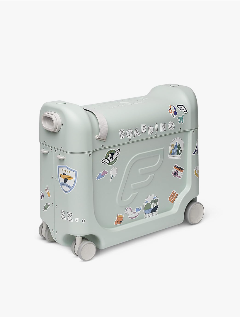 Stokke JetKids BedBox, Green Aurora - Ride-On Suitcase for Kids 2-7 Years Old (up to 77 lbs) - Transforms Into Bed - Includes Mattress, Decorative Stickers & Adjustable Carrying Strap