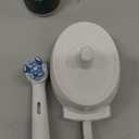 Oral-B Rechargeable Electric Toothbrush, iO2 Starter Kit, 3 Cleaning Modes, Automatic Pressure Sensor to Protect Gums, 2 Brush Heads, Forest Green (1 Count (Pack of 1))