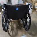 Medline Comfortable Folding Wheelchair with Swing-Back, Desk-Length Arms and Elevating Footrests, 20”W x 16”D Seat