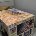 Nostalgia Retro 1000W Microwave Oven 1.1 Cu Ft Capacity  Child Safety Lock, 8 Auto-Cook Settings  Countertop Kitchen Appliance  Black