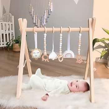 Foldable Wooden Baby Play Gym with 6 Sensory Toys – Montessori Activity Center for Newborns, No-Tool Assembly, Natural Wood Indoor Gym for Infant Motor Development & Tummy Time