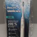 Philips Sonicare 2100 Series Electric Toothbrush  Sonic Toothbrush with Advanced Sonic Technology, Two Intensity Settings, Smartimer & Quadpacer, White, Model HX3661/04