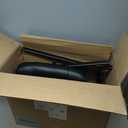 Amazon Basics Classic Faux Leather Office Desk Chair with Armrests, Metal Frame, Black, 27.4D x 23.6W x 35.8H in