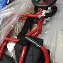 Medline Ultra Lightweight Transport Wheelchair for Adults, Foldable, 19-Inch Seat Width, Red Frame, Black Upholstery
