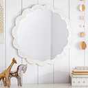 White sun-shaped mirror