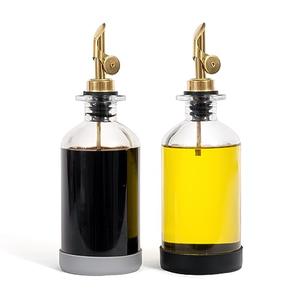 STOVE SHELF StoveShelf Oil and Vinegar Dispenser Set - Oil Dispensers with Silicone Base - Protects the Finish of Your StoveShelf - Glass Bottle with Gold Dispenser - Set of 2