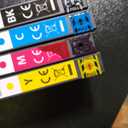 Epson 822XL ink cartridges in black, cyan, magenta, and yellow