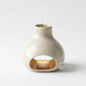 Off-white ceramic candle holder