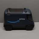 Radio Flyer Amazon Delivery Van, For Ages 2+, Ride and Deliver Truck for Kids, Under Seat Storage, Stationary Handle, Ergonomic Seat, Includes 3 Mini Amazon Boxes & 3 Wooden Toys, Toddler Ride On Toys