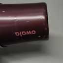 Owala FreeSip Sway Insulated Stainless Steel Water Bottle with Two-Way Spout, Built-In Straw and Bucket Handle, Made for Travel, School, and Sports, 40oz, BPA Free, Leak Proof, Black Cherry