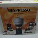 Nespresso Vertuo Next Coffee and Espresso Machine by Breville, Cherry Red, 1.1 Liters with complimentary starter set of Nespresso capsules,                    BBD 06/30/2022