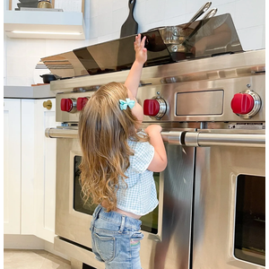 Adjustable Stove Guard. The Prince Lionheart adjustable stoveGUARD helps prevent scalds and burns, providing a barrier between dangerous stove top hazards and little hands. The stove guard is adjustable to fit stoves 24in x 36in (61cm-91 cm) and incl