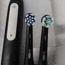 Oral-B iO Deep Clean Rechargeable Electric Powered Toothbrush, Black with iO Series 3 Limited, 2 Brush Heads and Travel Case - Pressure Sensor to Protect Gums - 3 Cleaning Settings - 2 Minute Timer (1 Count (Pack of 1))