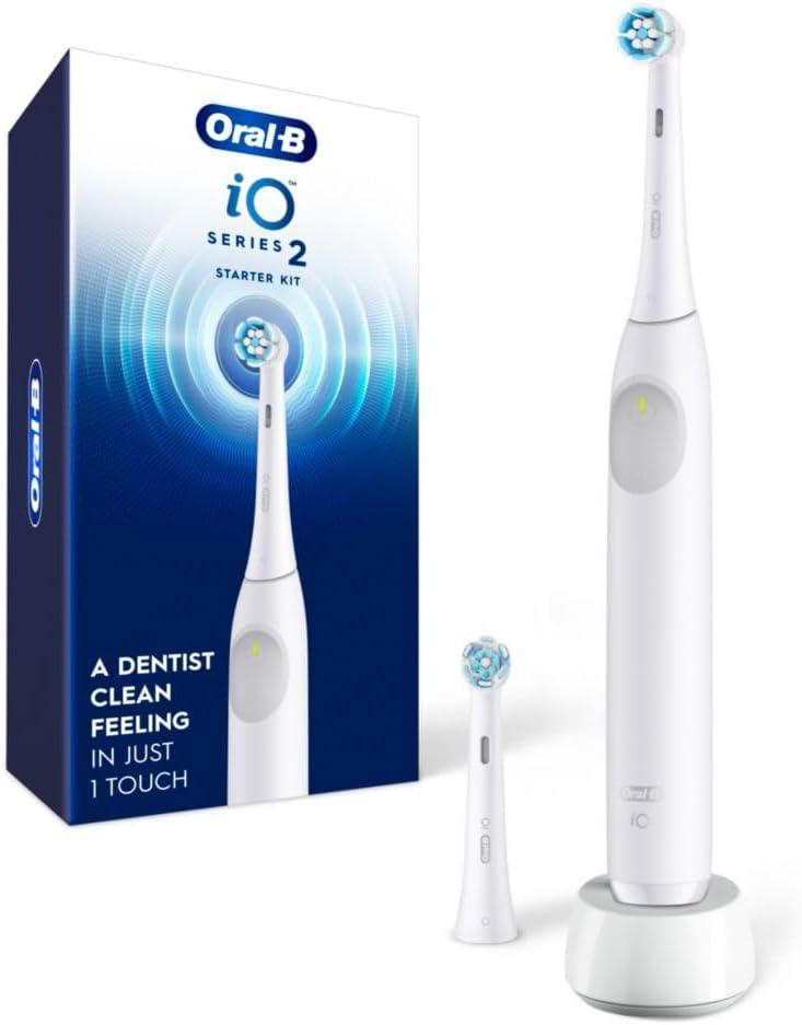 Oral-B Rechargeable Electric Toothbrush, iO2 Starter Kit, 3 Cleaning Modes, Automatic Pressure Sensor to Protect Gums, 2 Brush Heads, Pure White (1 Count (Pack of 1))