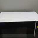 Farberware 0.9 Cu. Ft. Countertop Microwave Oven  900W Power, Auto Cook Settings, Defrost, and Safety Lock  White