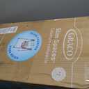 Graco Slim Spaces Compact Baby Swing, Space Saving Portable Bay Swing with Height Adjustable Legs & Soft Toys, Reign