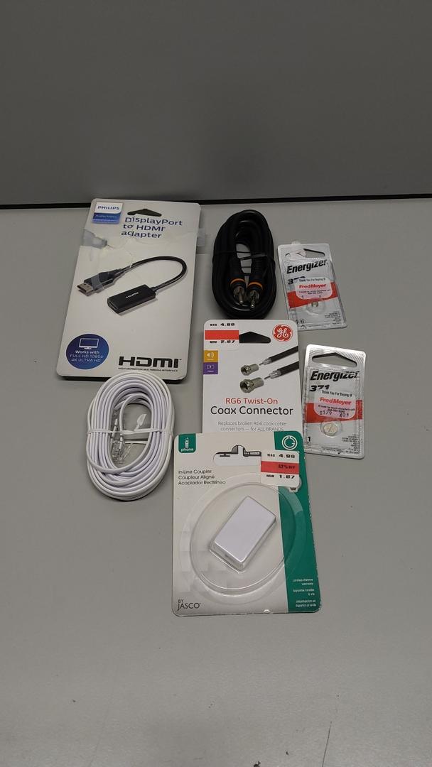DisplayPort to HDMI Adapter (boxed)

HDMI cable (black)

White cable (appears to be an Ethernet or phone cable)

Energizer lithium coin batteries (2 packs)

Ring Video Doorbell Wired (boxed)

Wall cord cover / cable management kit (small white kit in box)