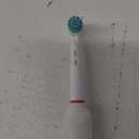 Oral-B iO Deep Clean + Protect Rechargeable Electric Toothbrush, White with a iO Series 7 Toothbrush, 2 Replacement Brush Heads, and a Charging Travel Case