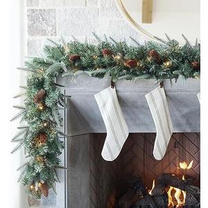 Amazon.com: Somikis 9FT Christmas Garland, Battery Operated Pre-Lit Xmas Garland, w/LED Lights and Realistic Arctic Spruce Pine Cones, for Mantle Stair Railing Indoor Outdoor : Home & Kitchen