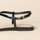 Amazon Essentials womens Flat Strap Sandals (5, Black Patent)