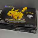 MEGA Pokmon Building Toys Set Motion Pikachu with 1092 Pieces and Running Movement, for Adult Collectors