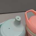 Tommee Tippee Insulated 9oz Sporty Spout Toddler Water Bottle, No Spill, Sippy Cups for Toddlers 1-3, Two-Piece Valve Helps Stop Spills, Green & Red, BPA Free, Pack of 2